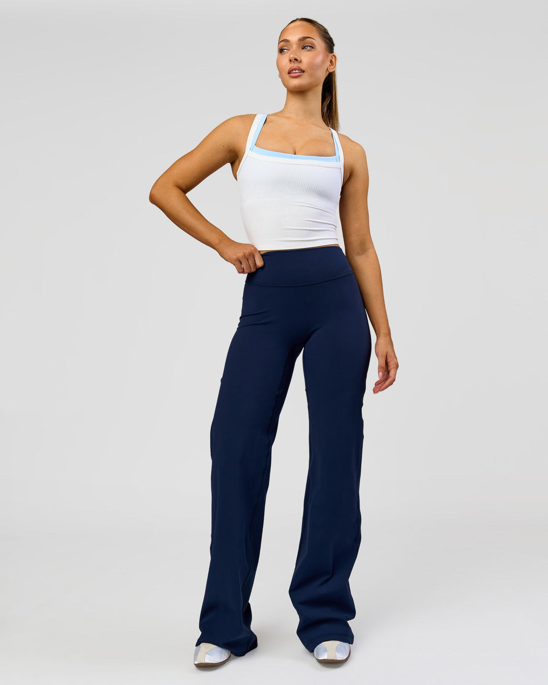 Woman wearing Fusion V-Contour High-Rise Tall Pant - Future Navy | Model:Claire | Size:S