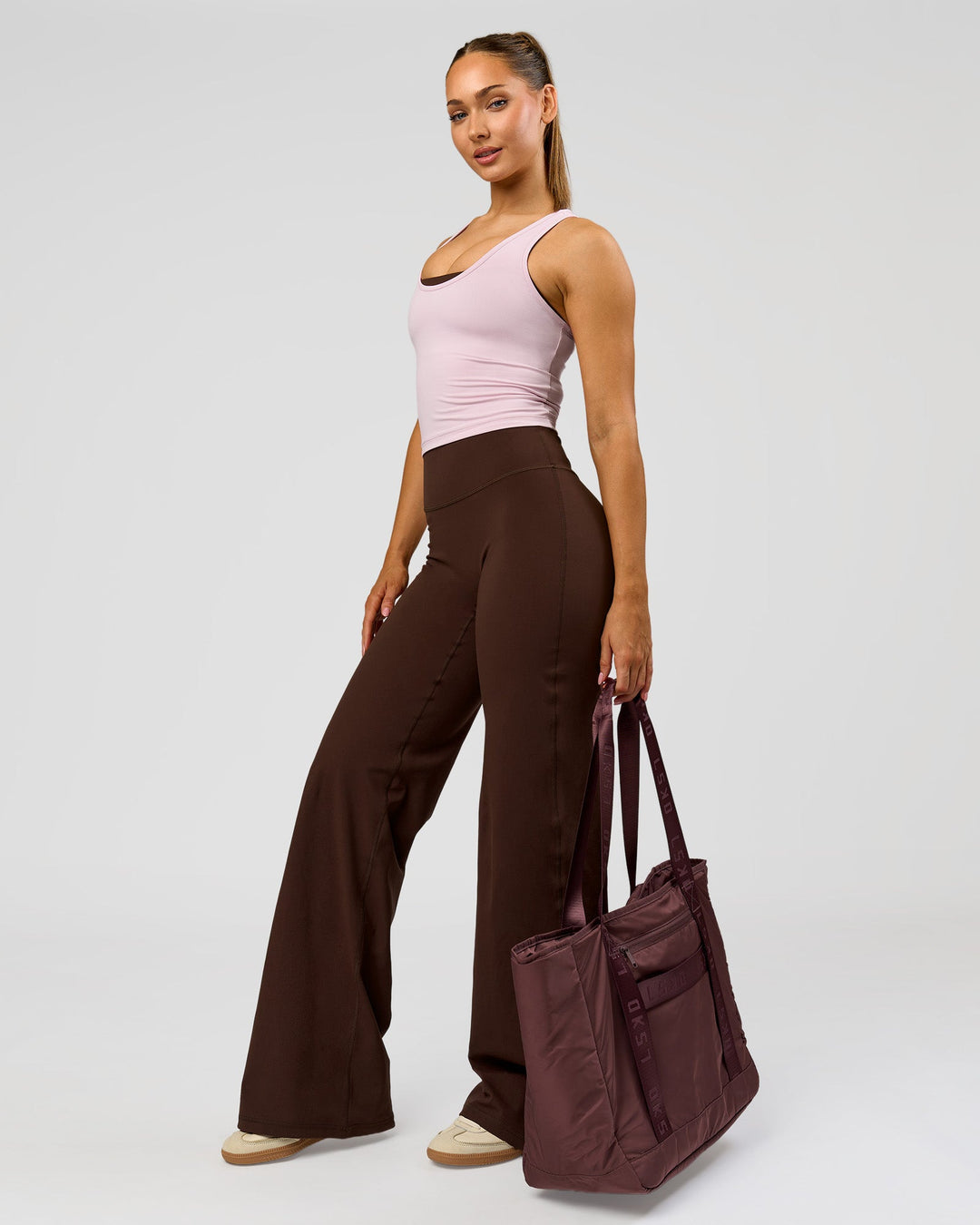 Woman wearing Fusion V-Contour High-Rise Tall Pant - Hot Chocolate | Model:Claire | Size:S