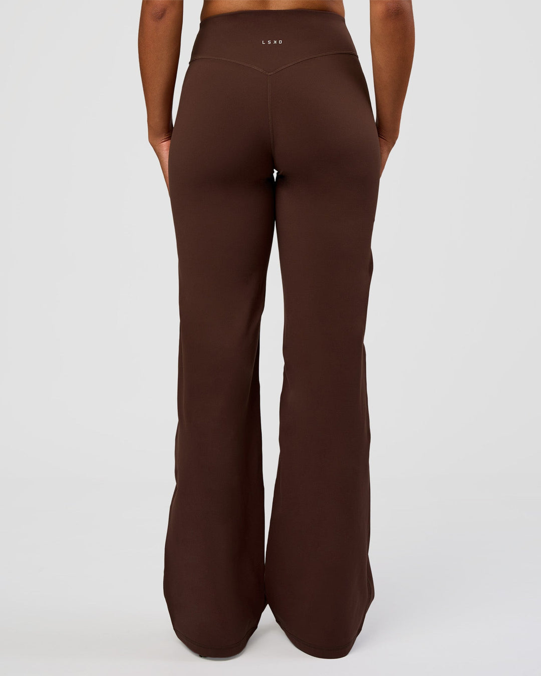Woman wearing Fusion V-Contour High-Rise Tall Pant - Hot Chocolate | Model:Rosie | Size:S