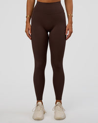 Woman wearing Fusion V-Contour Ultra High-Rise Full Length Legging Pockets - Hot Chocolate | Model:Amity | Size:S