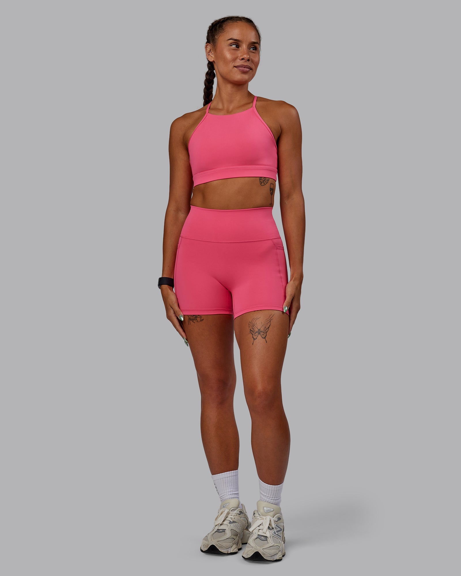 Woman wearing Fusion Ultra High-Rise 4" Short Pockets - Hot Pink | Model:Vanessa | Size:S