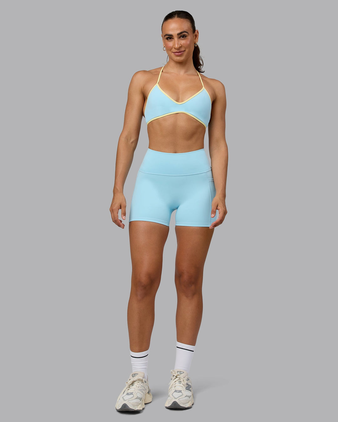 Woman wearing Fusion X-Short Tights with Pockets - Crystal Blue