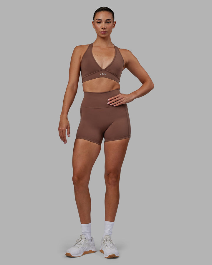 Woman wearing Fusion X-Length Shorts - Dull Rust
