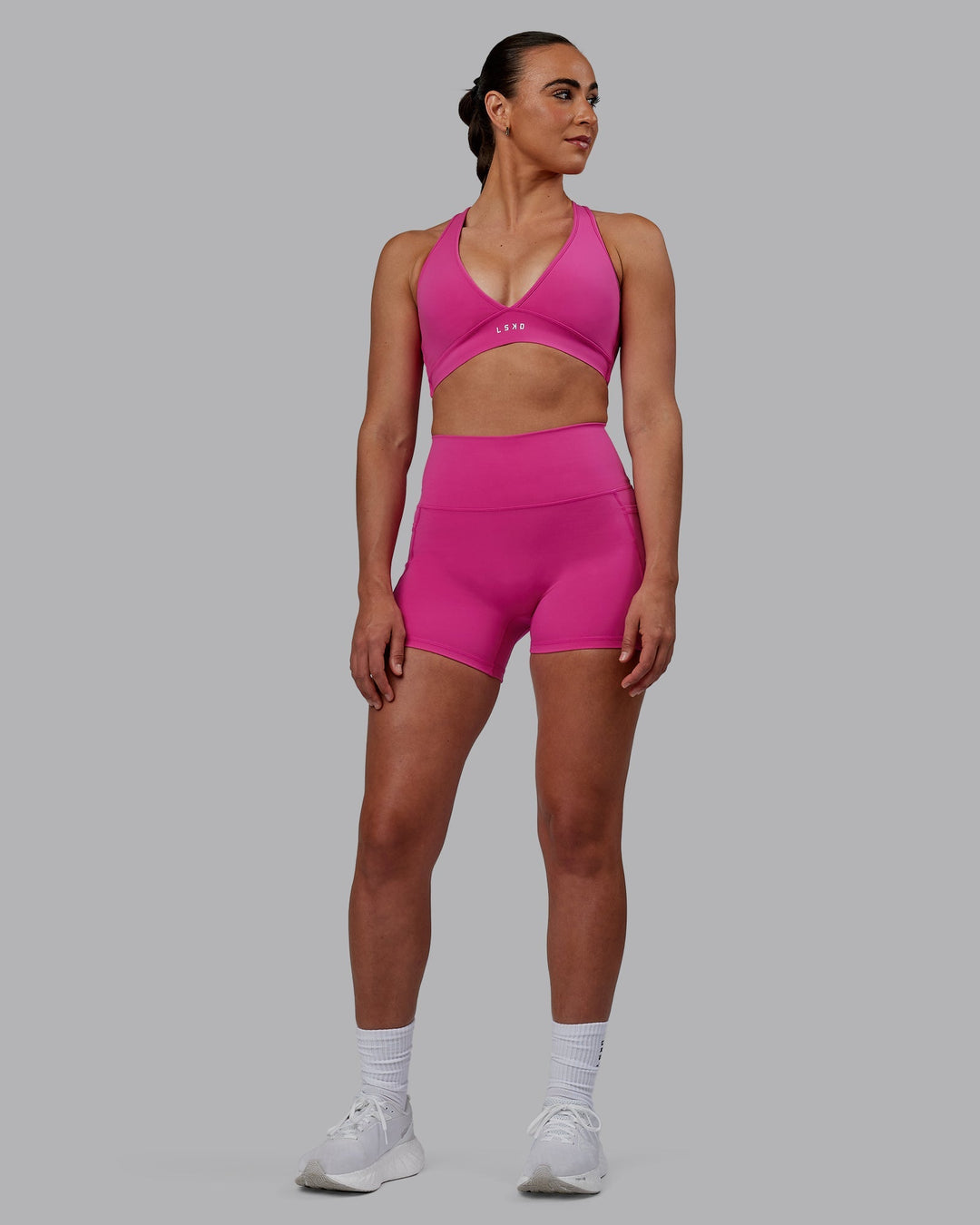 Woman wearing Fusion X-Length Shorts - Fuchsia Pink