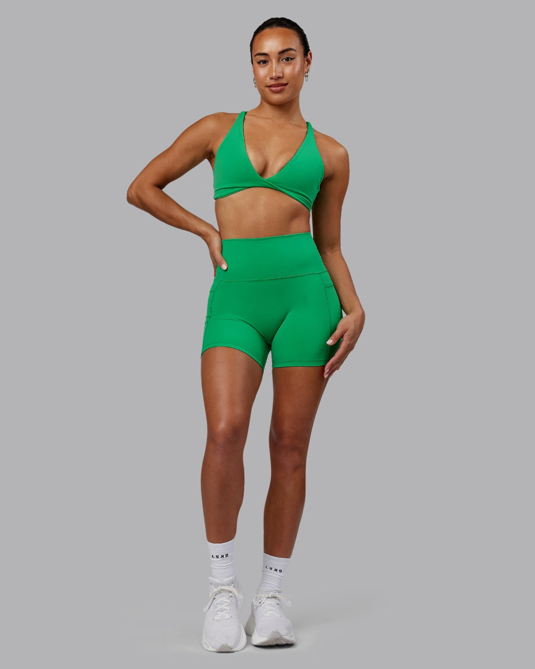 Woman wearing Fusion X-Length Shorts - Impact Green