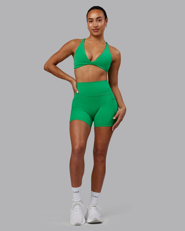 Woman wearing Fusion X-Length Shorts - Impact Green
