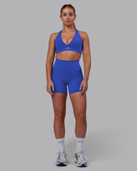 Woman wearing Fusion Ultra High-Rise 4" Short Pockets - Power Cobalt | Model:Hannah | Size:S