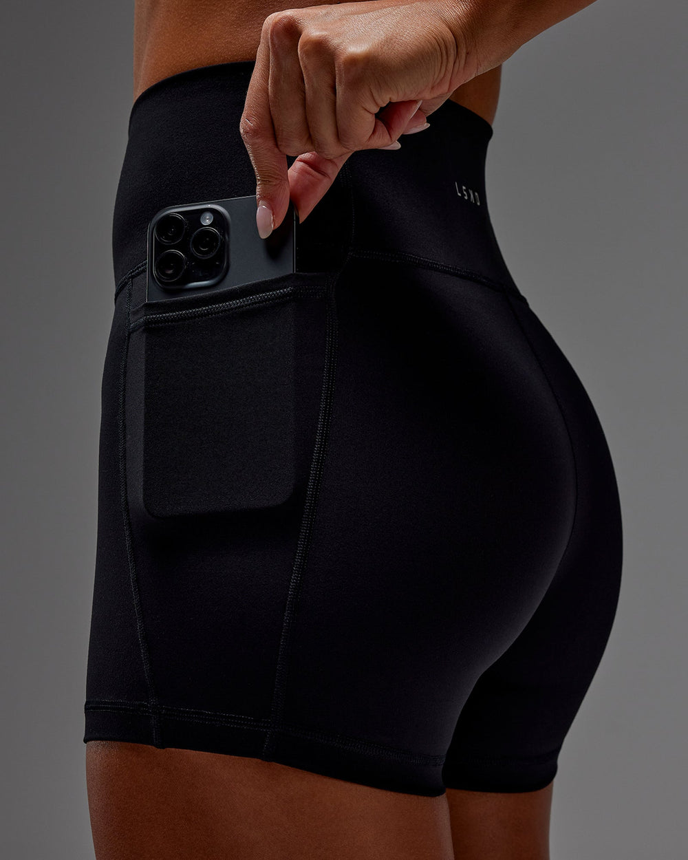 Woman wearing Fusion X-Short Tight With Pockets in Black | Size:S