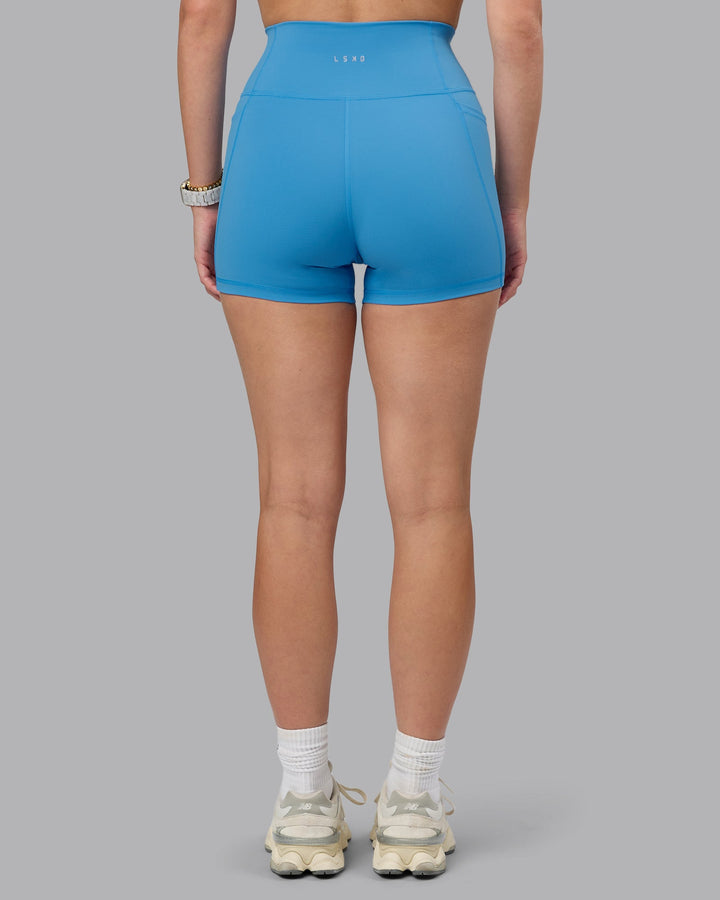 Woman wearing Fusion X-Short Tights With Pockets in Azure Blue | Size:S
