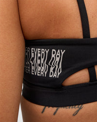 Woman wearing Galvanise Hype Graphic Sports Bra 2.0 - Black-Alloy | Model:Rhiley | Size:S | Thumbnail Index: 4