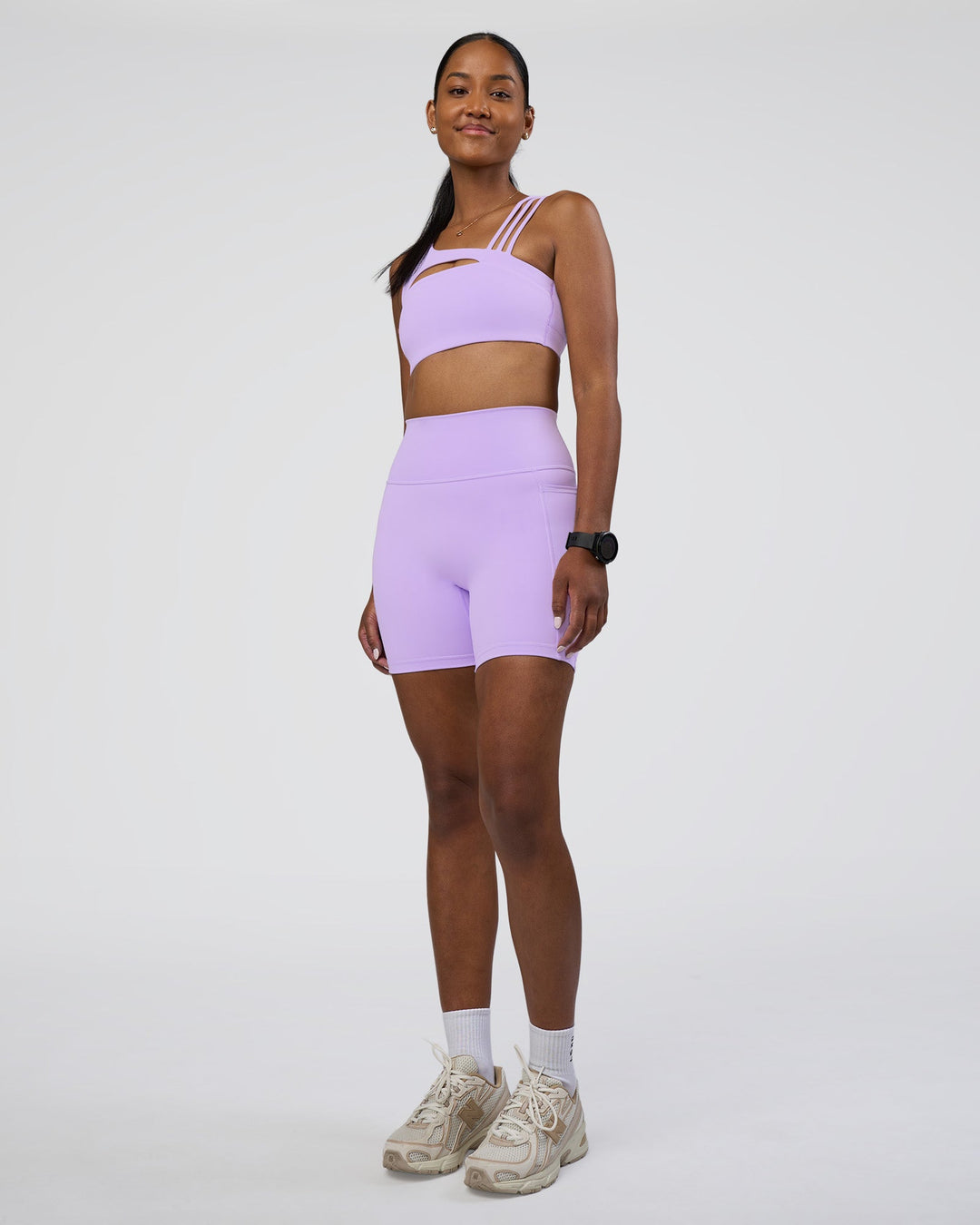 Woman wearing Galvanise Splice Sports Bra - Pale Lilac | Model:Rica | Size:S
