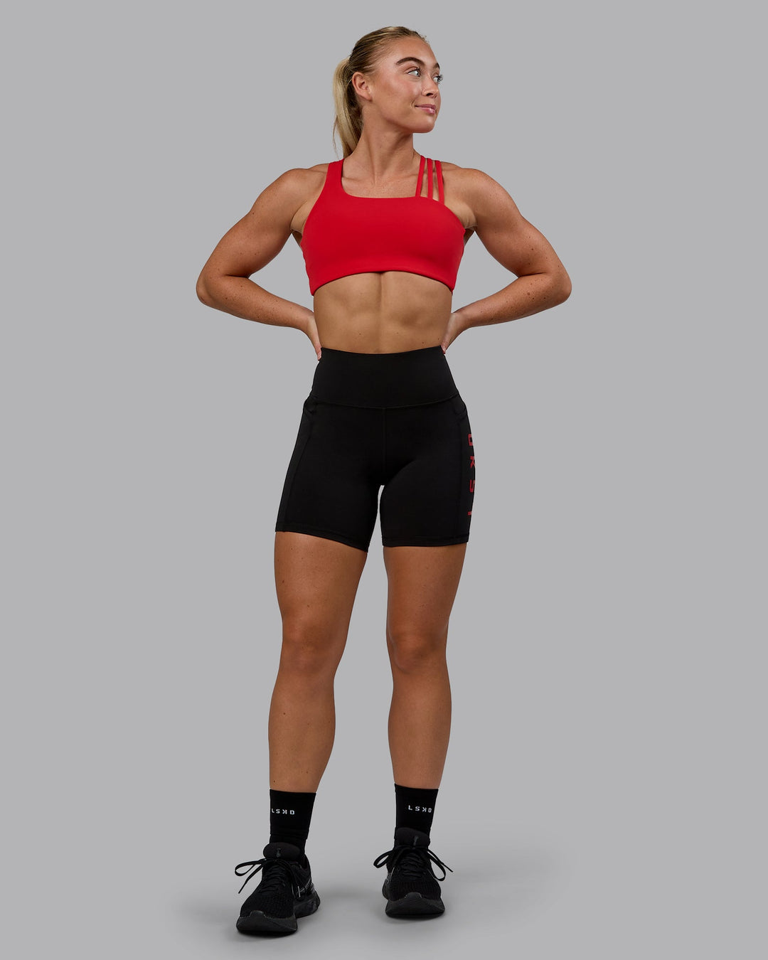 Woman wearing Galvanise Sports Bra - Crimson