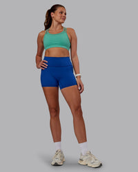 Woman wearing Genesis Layered Sports Bra - Agate Green | Model:Phoebe | Size:S