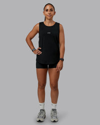 Woman wearing Go-To FLXCotton Longline Tank - Black-White | Size:S | Model:Tylah