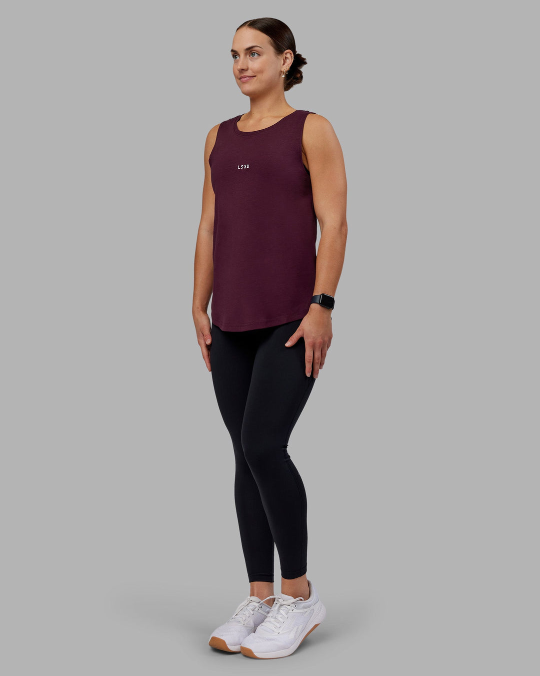 Woman wearing Go-To FLXCotton Longline Tank - Cherry Lacquer-White | Model:Keisha | Size:S