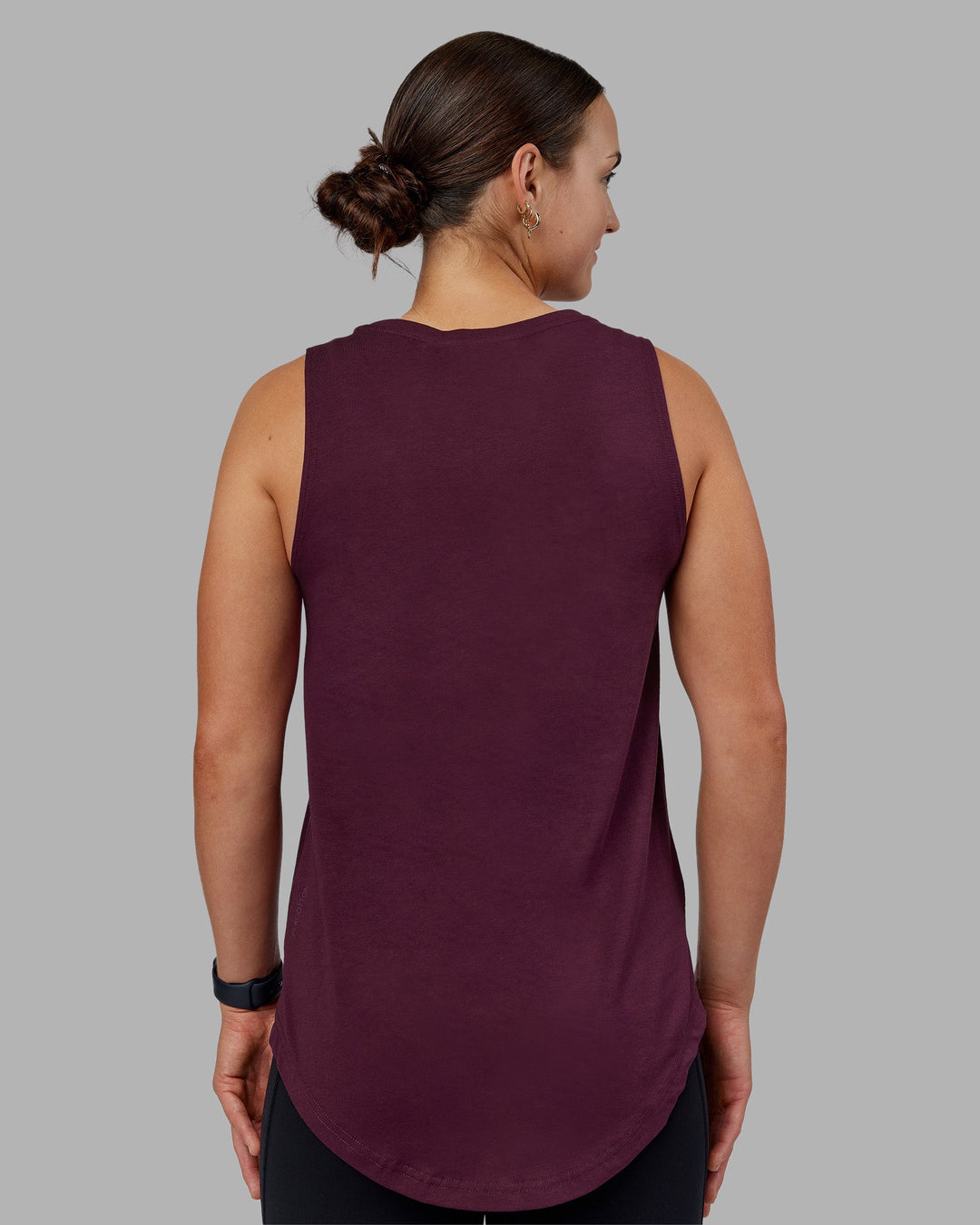 Woman wearing Go-To FLXCotton Longline Tank - Cherry Lacquer-White | Model:Keisha | Size:S