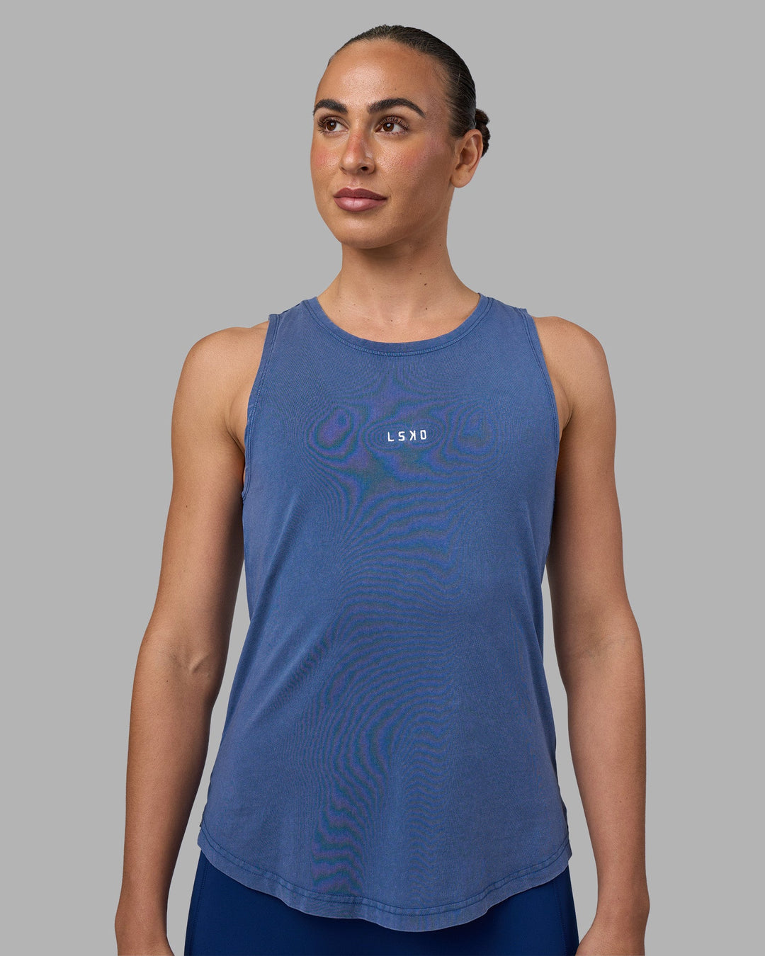 Woman wearing Go-To FLXCotton Longline Tank - Midnight Blue Washed-White | Model:Sophie | Size:S