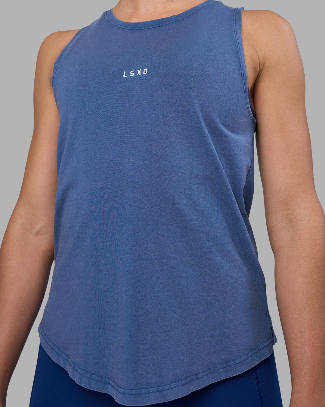 Woman wearing Go-To FLXCotton Longline Tank - Midnight Blue Washed-White | Model:Sophie | Size:S