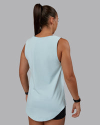 Woman wearing Go-To FLXCotton Longline Tank - Skyride-White | Size:S | Model:Tylah | Thumbnail Index: 2