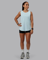 Woman wearing Go-To FLXCotton Longline Tank - Skyride-White | Size:S | Model:Tylah | Thumbnail Index: 3