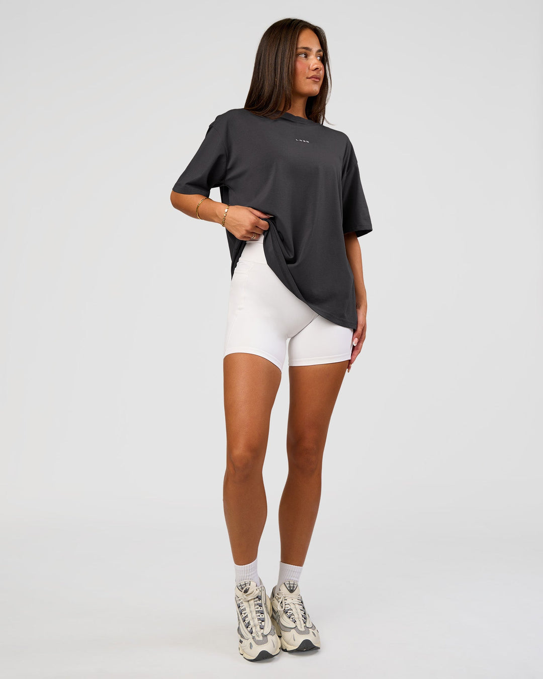 Woman wearing Go-To FLXCotton Oversized Tee - Dark Storm-White | Model:Bianca | Size:S