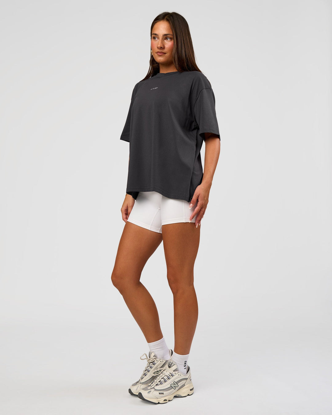 Woman wearing Go-To FLXCotton Oversized Tee - Dark Storm-White | Model:Bianca | Size:S