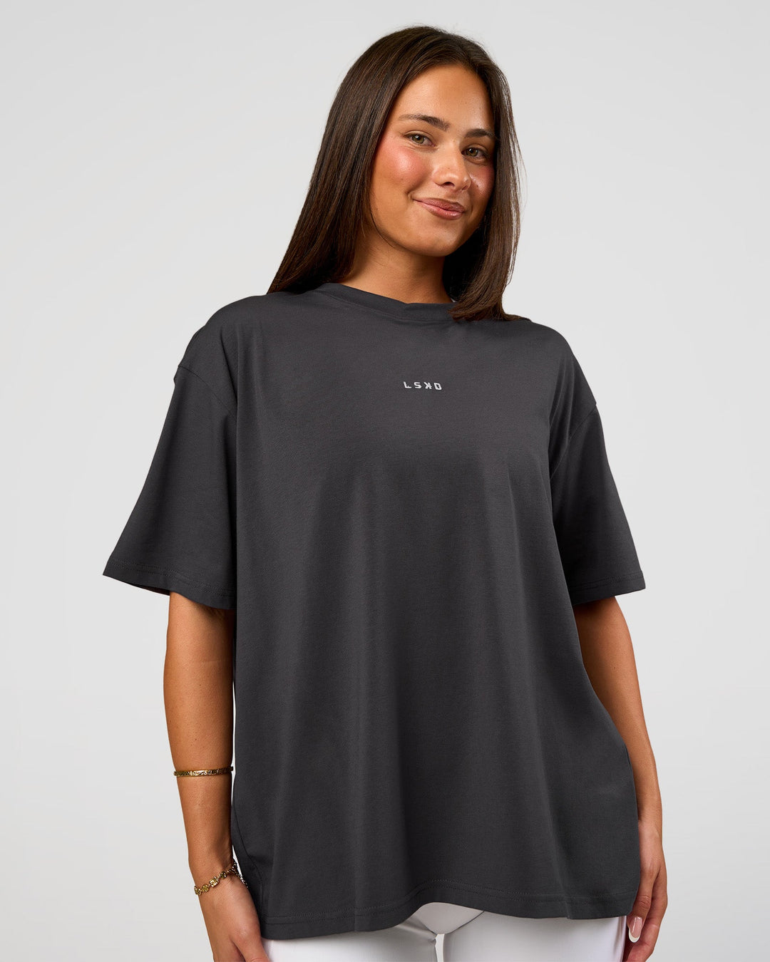 Woman wearing Go-To FLXCotton Oversized Tee - Dark Storm-White | Model:Bianca | Size:S