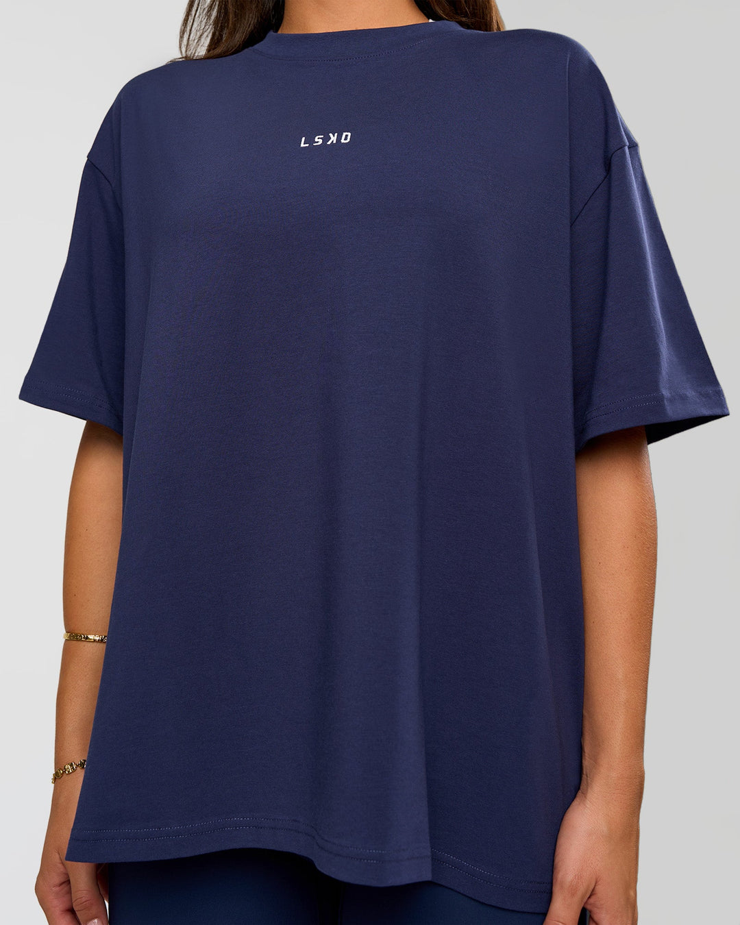Woman wearing Go-To FLXCotton Oversized Tee - Future Navy-White | Model:Bianca | Size:S