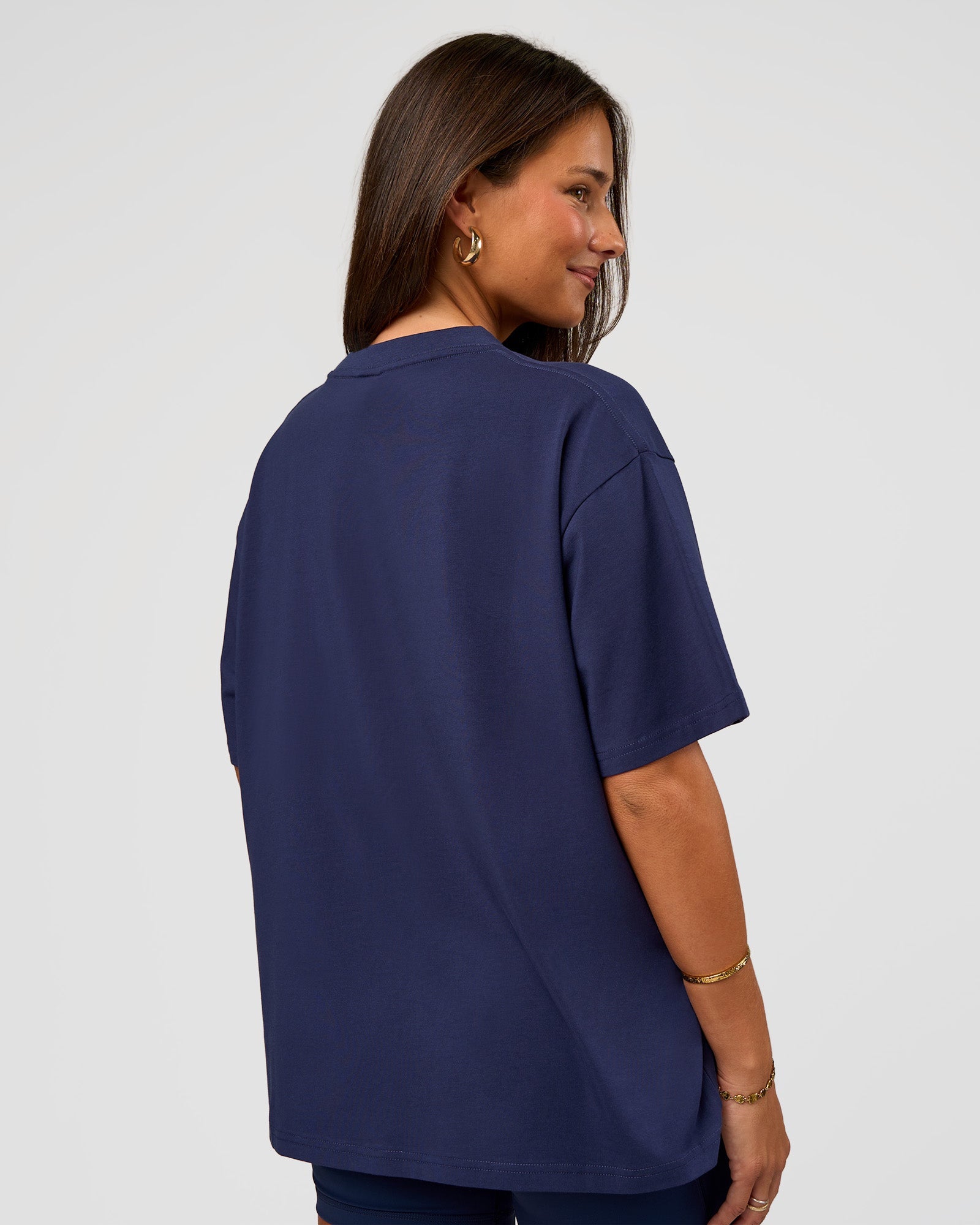Woman wearing Go-To FLXCotton Oversized Tee - Future Navy-White | Model:Bianca | Size:S