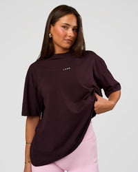 Woman wearing Go-To FLXCotton Oversized Tee - Midnight Plum-White | Model:Bianca | Size:S