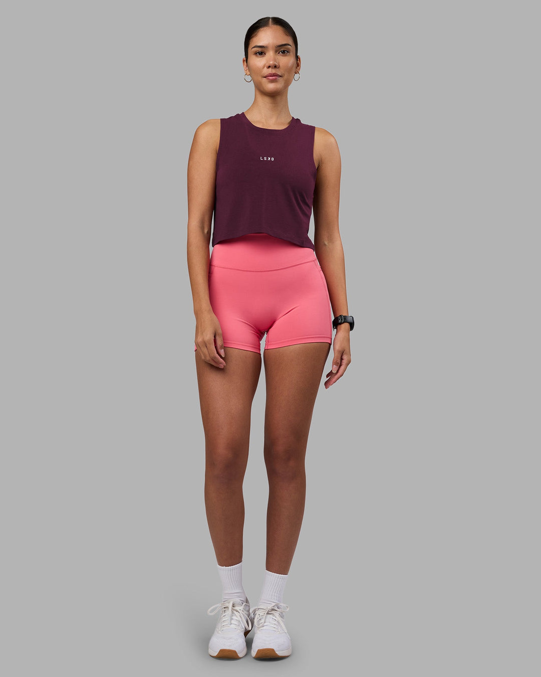 Woman wearing Go-To FLXCotton Tank - Cherry Lacquer-White | Model:Rhiley | Size:S