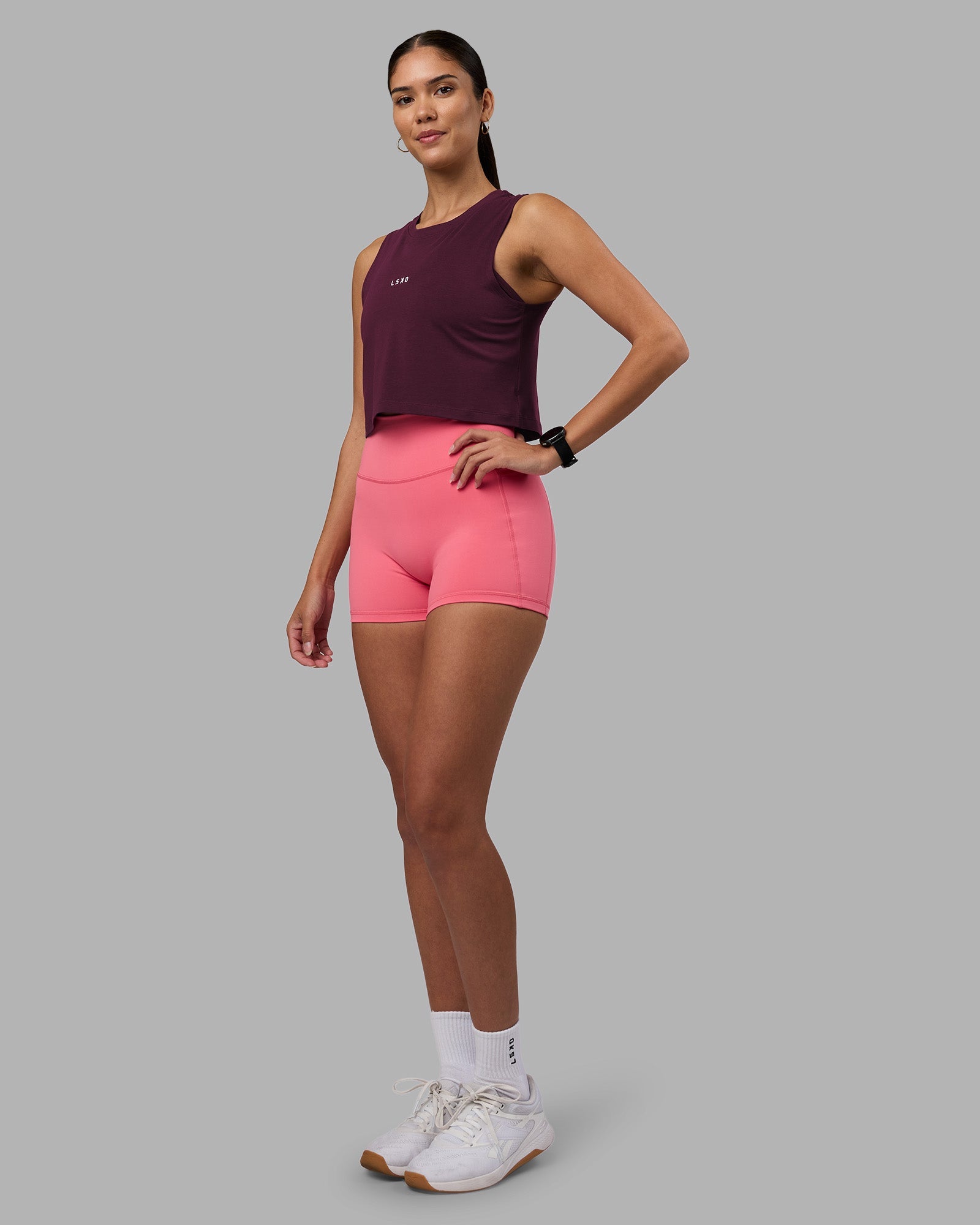 Woman wearing Go-To FLXCotton Tank - Cherry Lacquer-White | Model:Rhiley | Size:S