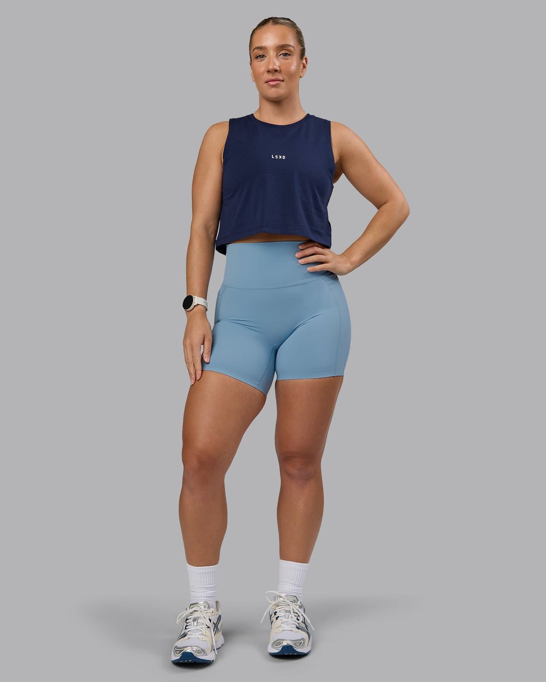 Woman wearing Go-To FLXCotton Tank - Future Navy-White