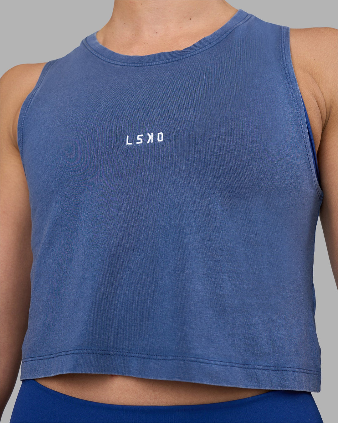 Woman wearing Go-To FLXCotton Tank - Midnight Blue Washed-White | Model:Sophie | Size:S