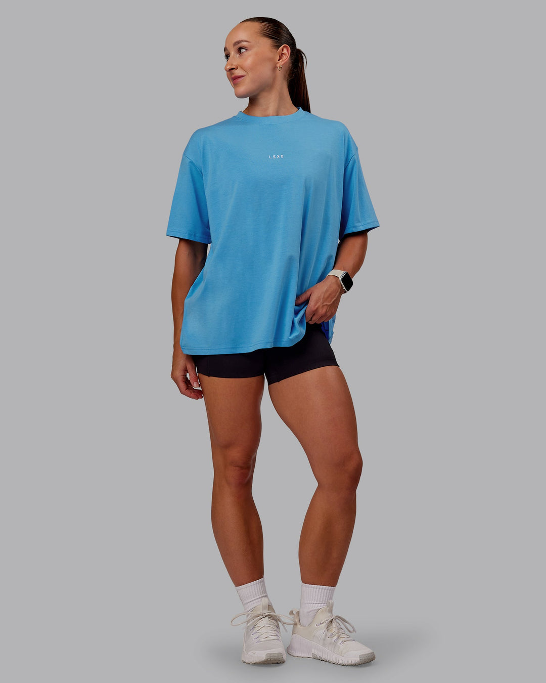 Woman wearing Go-To FLXCotton Oversized Tee in Azure Blue-White | Size:S