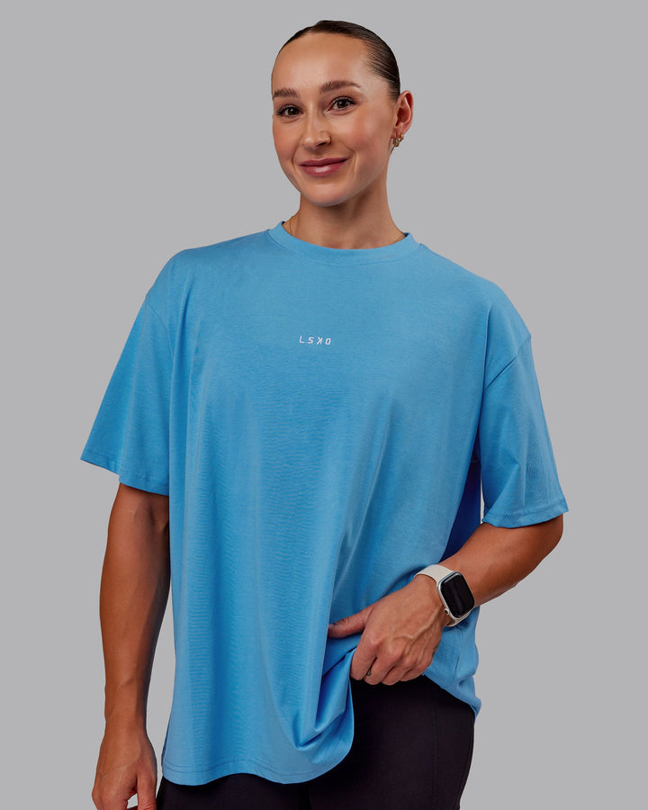 Woman wearing Go-To FLXCotton Oversized Tee in Azure Blue-White | Size:S
