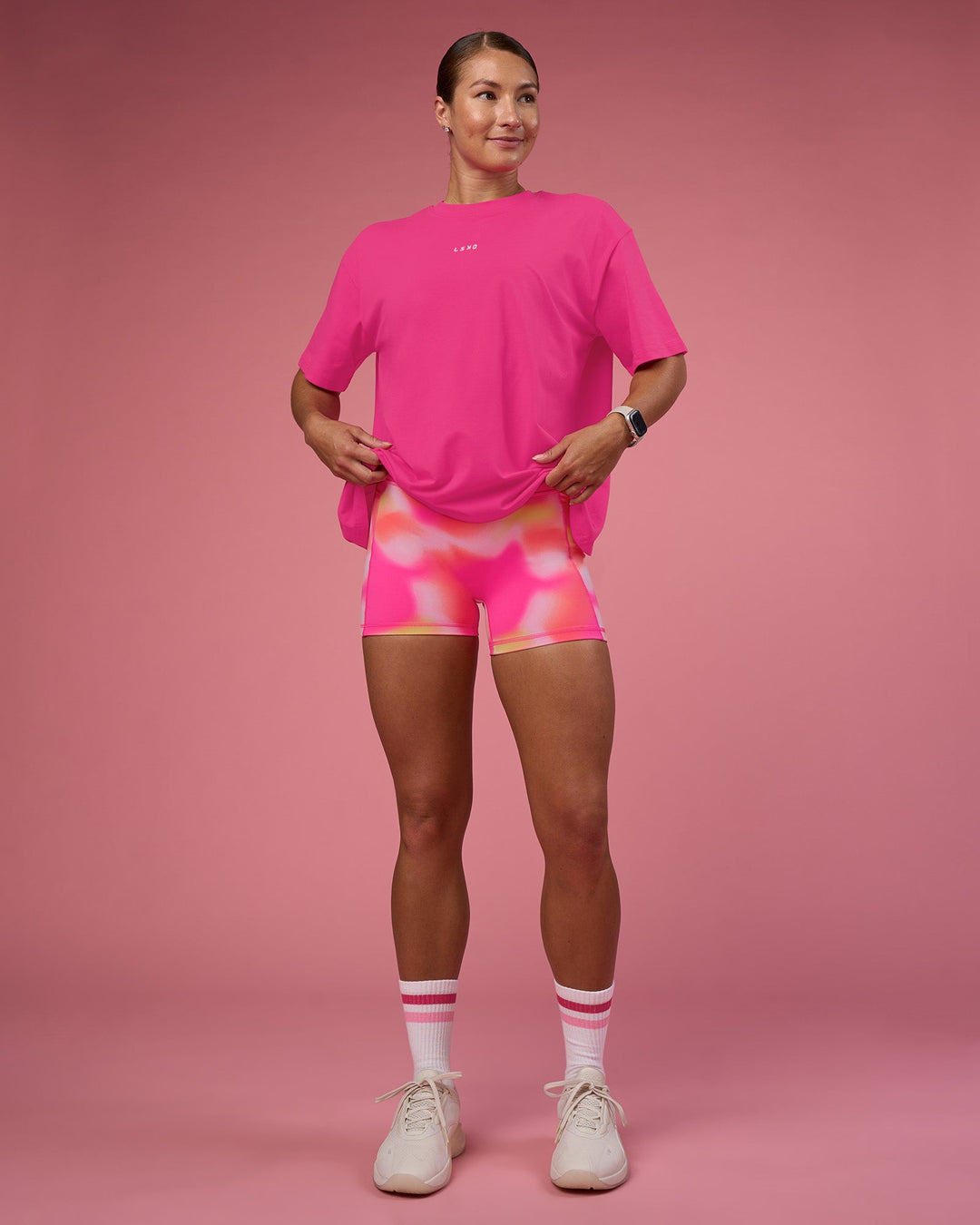 Woman wearing Go-To FLXCotton Oversized Tee - Ultra Pink-White | Model:Hannah | Size:S