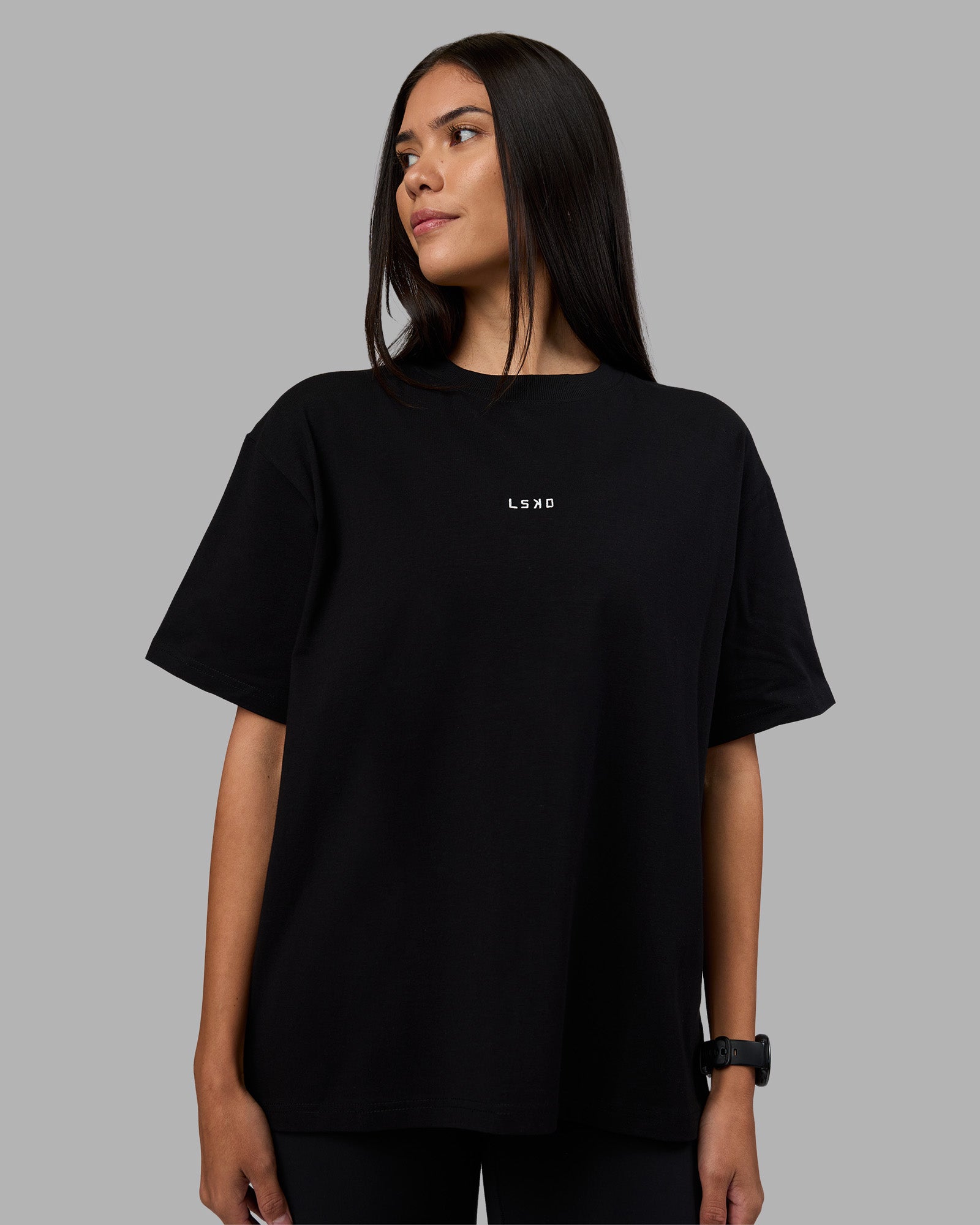 Woman wearing Go-To Heavyweight Oversized Tee - Black | Model:Rhiley | Size:S