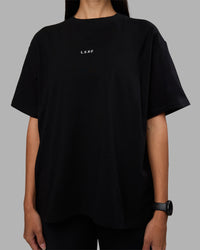 Woman wearing Go-To Heavyweight Oversized Tee - Black | Model:Rhiley | Size:S | Thumbnail Index: 3