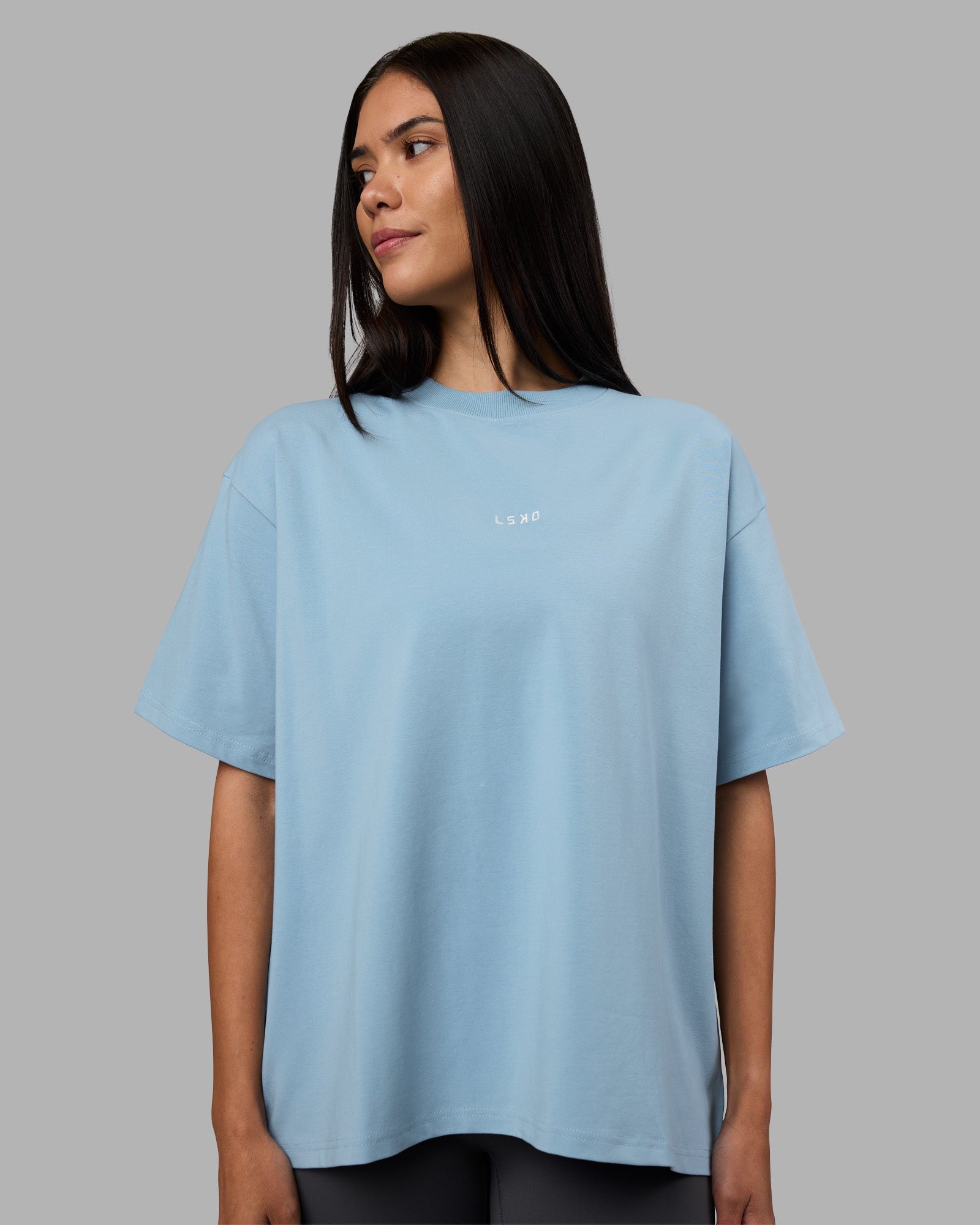 Woman wearing Go-To Heavyweight Oversized Tee - Glacier Lake | Model:Rhiley | Size:S