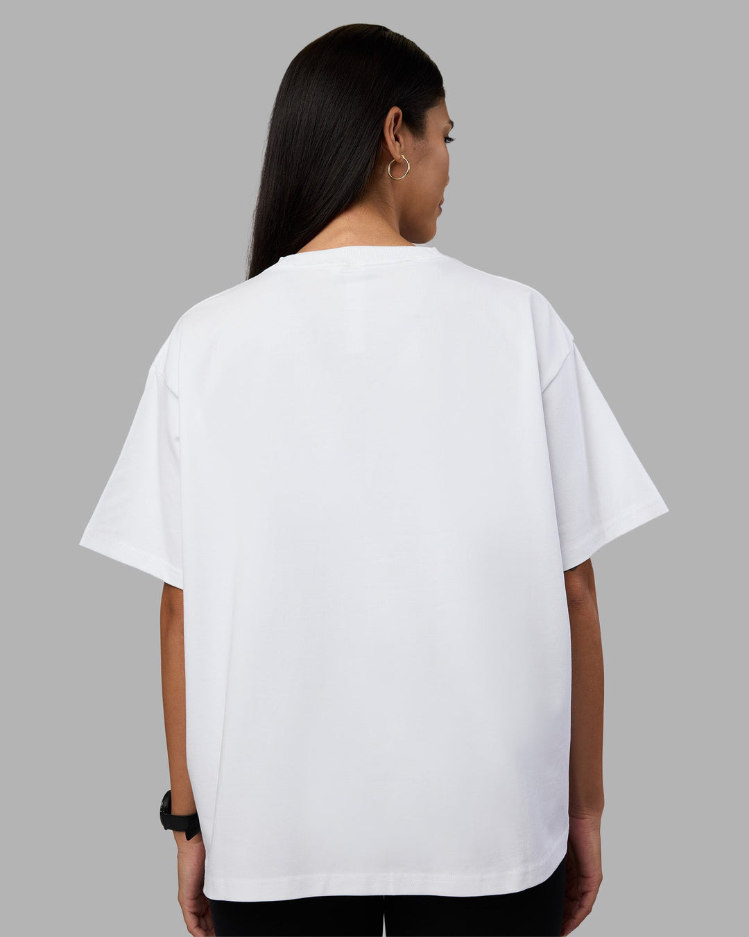 Woman wearing Go-To Heavyweight Oversized Tee - White | Model:Rhiley | Size:S