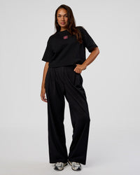 Woman wearing Go-To Heavyweight Reflective Skimmer Tee - Black-Reflective | Model:Kirstyn | Size:S