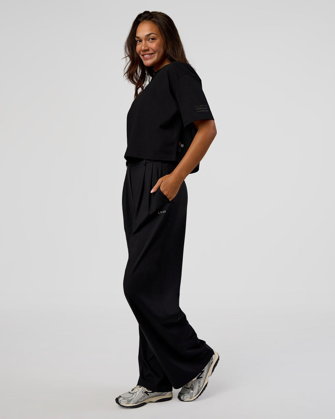 Woman wearing Go-To Heavyweight Reflective Skimmer Tee - Black-Reflective | Model:Kirstyn | Size:S