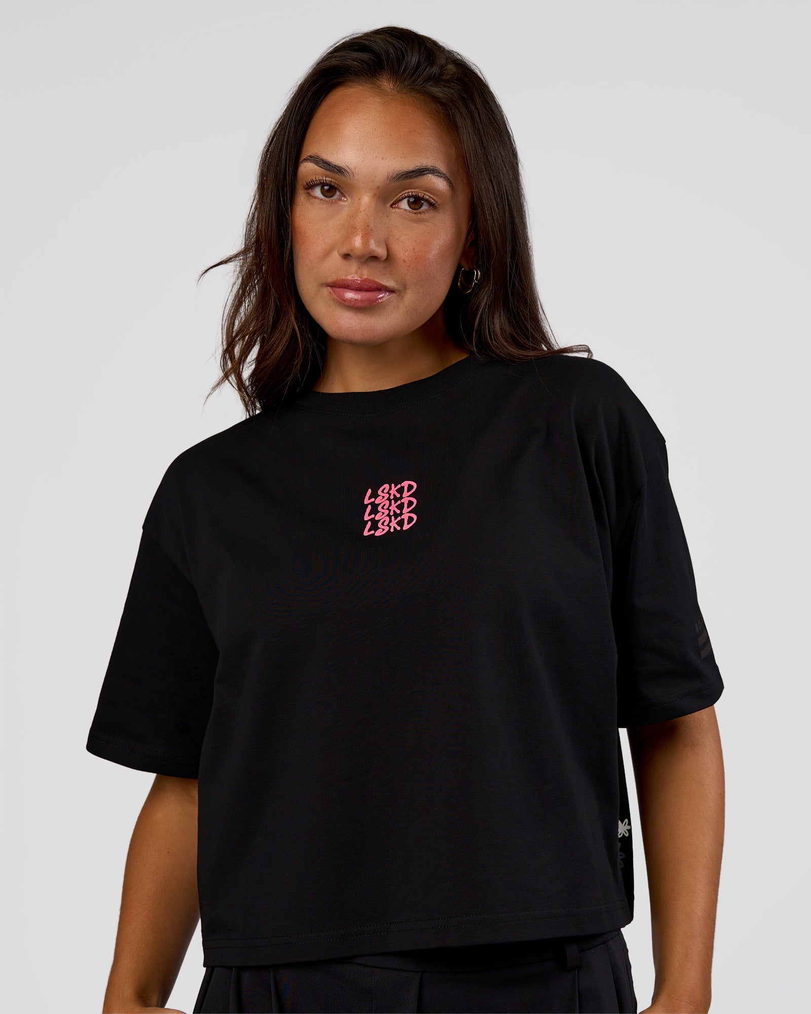 Woman wearing Go-To Heavyweight Reflective Skimmer Tee - Black-Reflective | Model:Kirstyn | Size:S