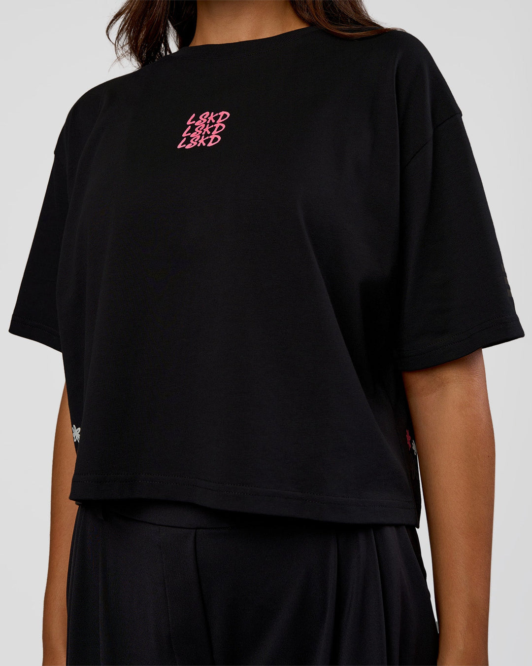 Woman wearing Go-To Heavyweight Reflective Skimmer Tee - Black-Reflective | Model:Kirstyn | Size:S