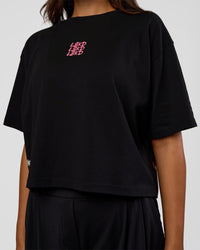 Woman wearing Go-To Heavyweight Reflective Skimmer Tee - Black-Reflective | Model:Kirstyn | Size:S