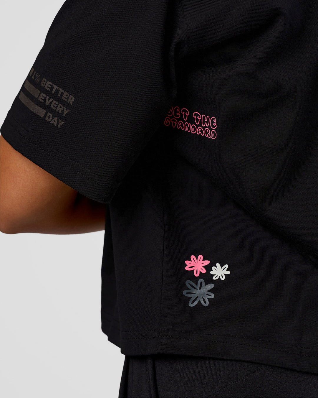 Woman wearing Go-To Heavyweight Reflective Skimmer Tee - Black-Reflective | Model:Kirstyn | Size:S