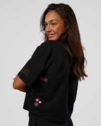 Woman wearing Go-To Heavyweight Reflective Skimmer Tee - Black-Reflective | Model:Kirstyn | Size:S