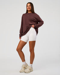 Woman wearing Go-To Long Sleeve FLXCotton Oversized Tee - Cocoa Powder-White | Model:Bianca | Size:S | Thumbnail Index: 4