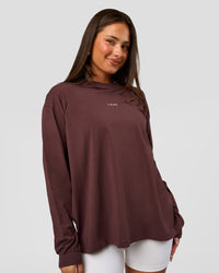Woman wearing Go-To Long Sleeve FLXCotton Oversized Tee - Cocoa Powder-White | Model:Bianca | Size:S | Thumbnail Index: 1